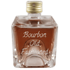 Bourbon Old Fashioned in extra small bottle. Popular alcoholic drinks.