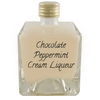 Chocolate Peppermint Cream Liqueur in small bottle. Hot cocoa alcohol. Drinks to make at home.