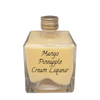 Mango Pineapple Cream Liqueur in small bottle. Fruity drinks. Drinks to make at home.