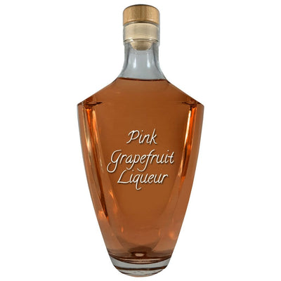 Pink Grapefruit Liqueur in large bottle. Bar drinks. Spirits. Popular alcoholic drinks.