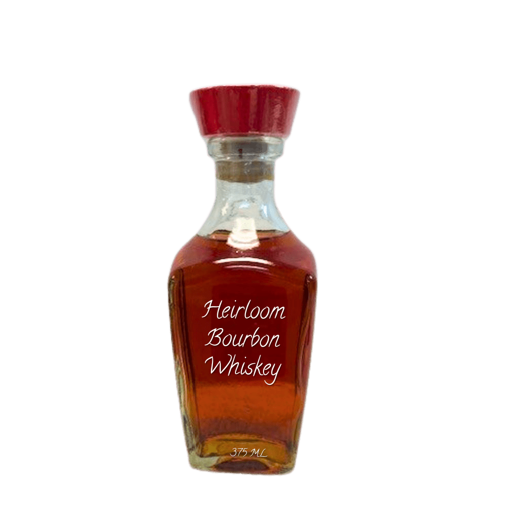 Bottle of Heirloom Bourbon Whiskey with a red cap on a white background