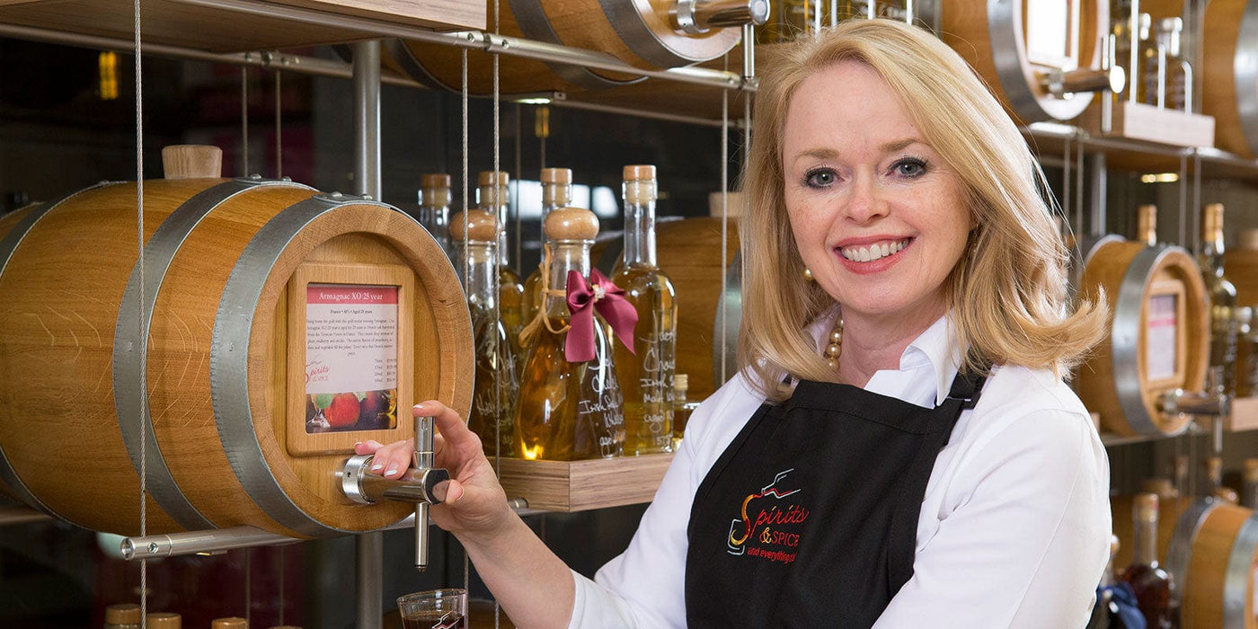 Kim Weiss pouring a sample of whiskey