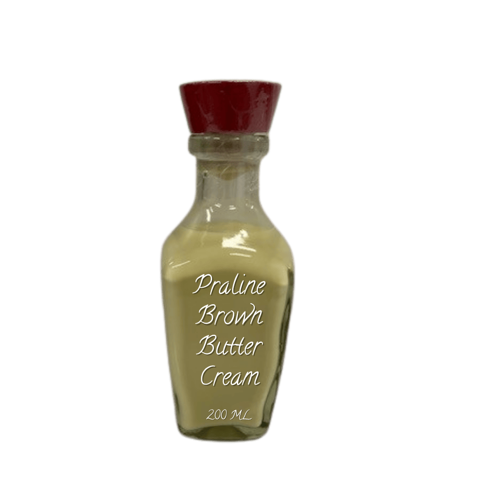 Bottle of Praline Brown Butter Cream with a red cap on a white background