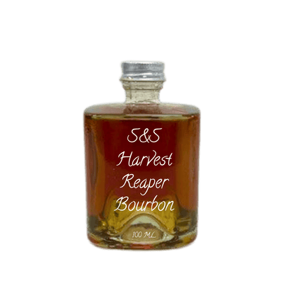 A 100 ml glass bottle of S&S Harvest Reaper Bourbon, filled with amber-brown liquid, featuring white text on the front and a silver metal cap, isolated on a white background.
