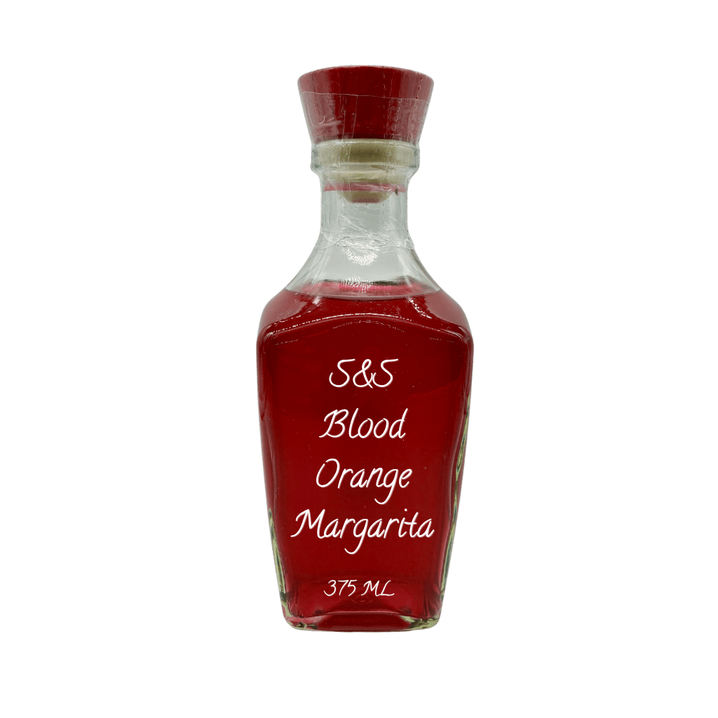 A clear glass bottle filled with a deep red liquid, sealed with a red cap, and labeled 'S&S Blood Orange Margarita 375 ML' in white script, isolated on a white background.