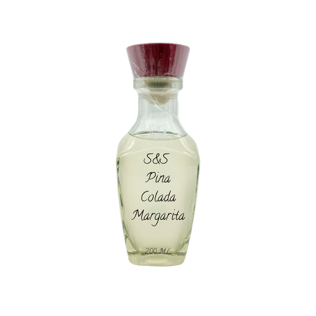 A clear glass bottle of S&S Pina Colada Margarita fragrance with a dark red cap, containing a pale yellow liquid, set against a plain white background.