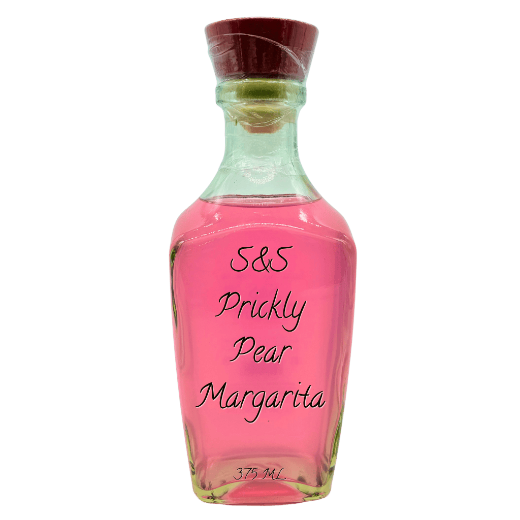 A clear glass bottle filled with bright pink liquid, sealed with a brown cork stopper, and labeled 'S&S Prickly Pear Margarita' on a plain white background.