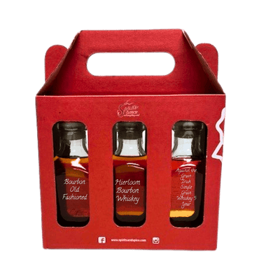 Red gift box with three bottles of whiskey on a white background. fathers day set