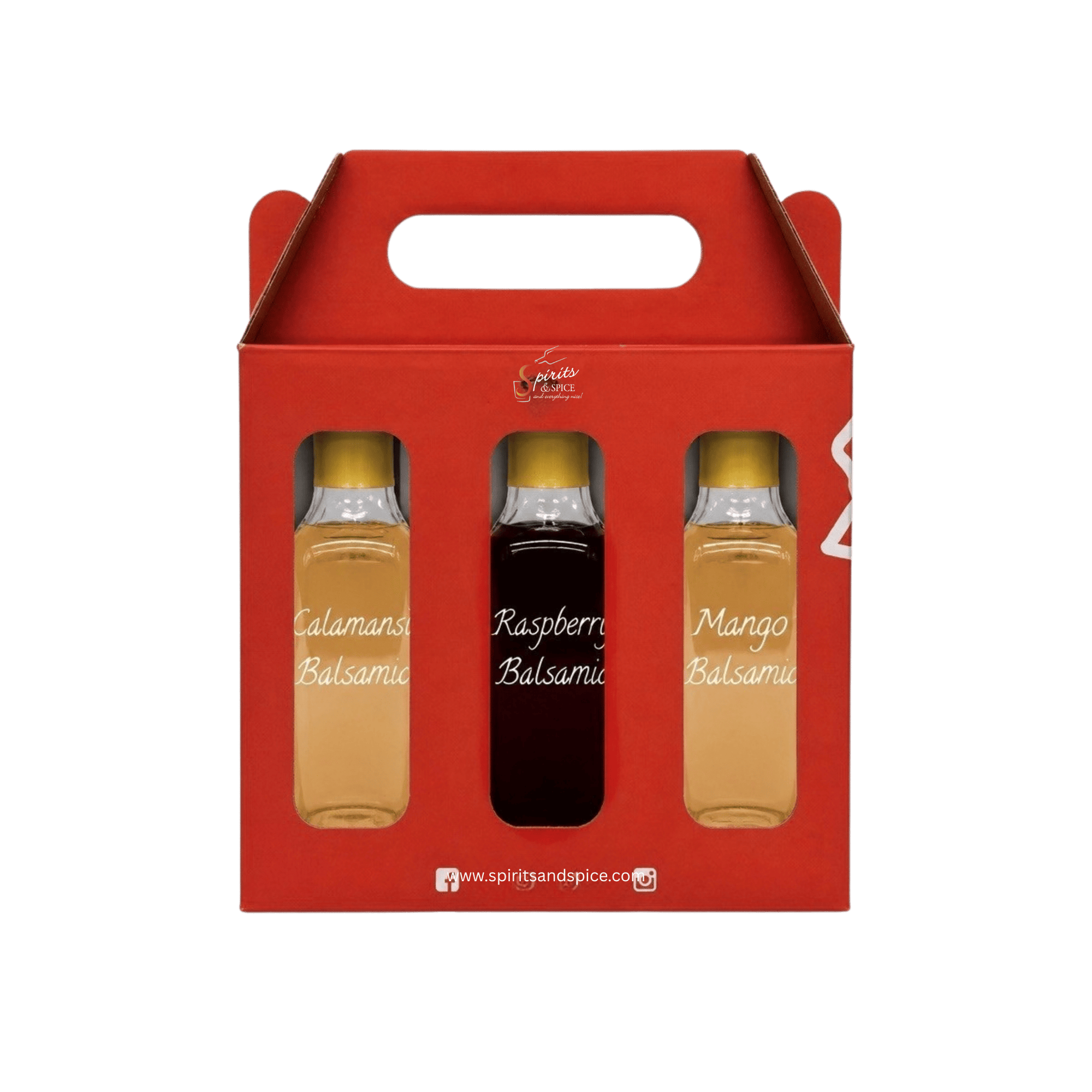 A red gift box containing three small bottles of fruit balsamoo syrup: Calamans Balsamoo, Raspberry Balsamoo, and Mango Balsamoo, shown on a plain white background.