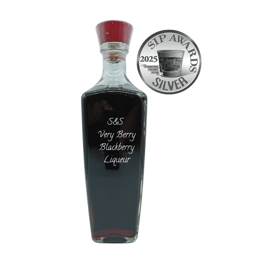 Bottle of S&S Very Berry Blackberry Liqueur with a silver award badge on a white background
