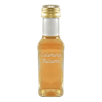 Calamansi Balsamic Vinegar in bottle. Difference between vinegar and vinaigrette