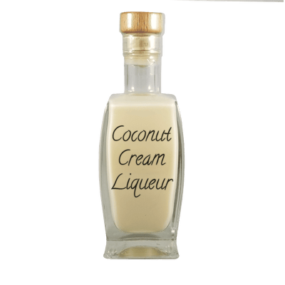 Coconut Cream Liqueur in in medium bottle. Smooth and sweet alcoholic drinks. Rum drinks.