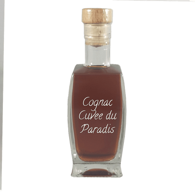 Cognac Cuvee du Paradis in small bottle. Aged alcoholic drinks. Drinks from France or Paris.