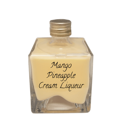 Mango Pineapple Cream Liqueur in small bottle. Fruity drinks. Drinks to make at home.