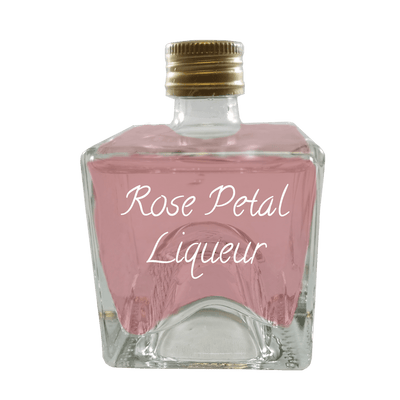 Rose Petal Liqueur in very small bottle. Floral drinks.