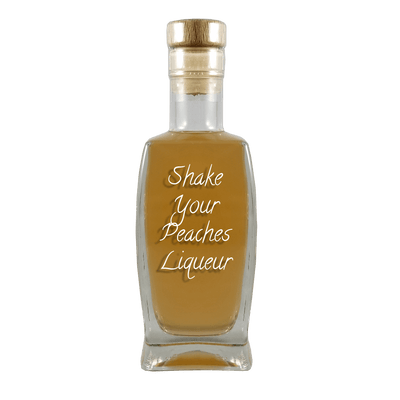 Shake Your Peaches Liqueur in medium bottle. Smooth and sweet alcoholic drinks. Fruity drinks.