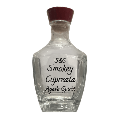 Smokey Cupreata Agave Spirit in bottle. Popular alcoholic drinks. Mixed cocktails. Fruity drinks.