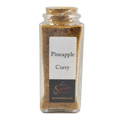 Pineapple Curry in bottle. Spices for curry. Spice mix.  Spicy foods.