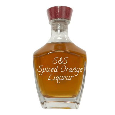 Spiced Orange Liqueur in bottle. Spirits. Popular alcoholic drinks. Fruity mixed drinks. Sweet alcoholic drinks.