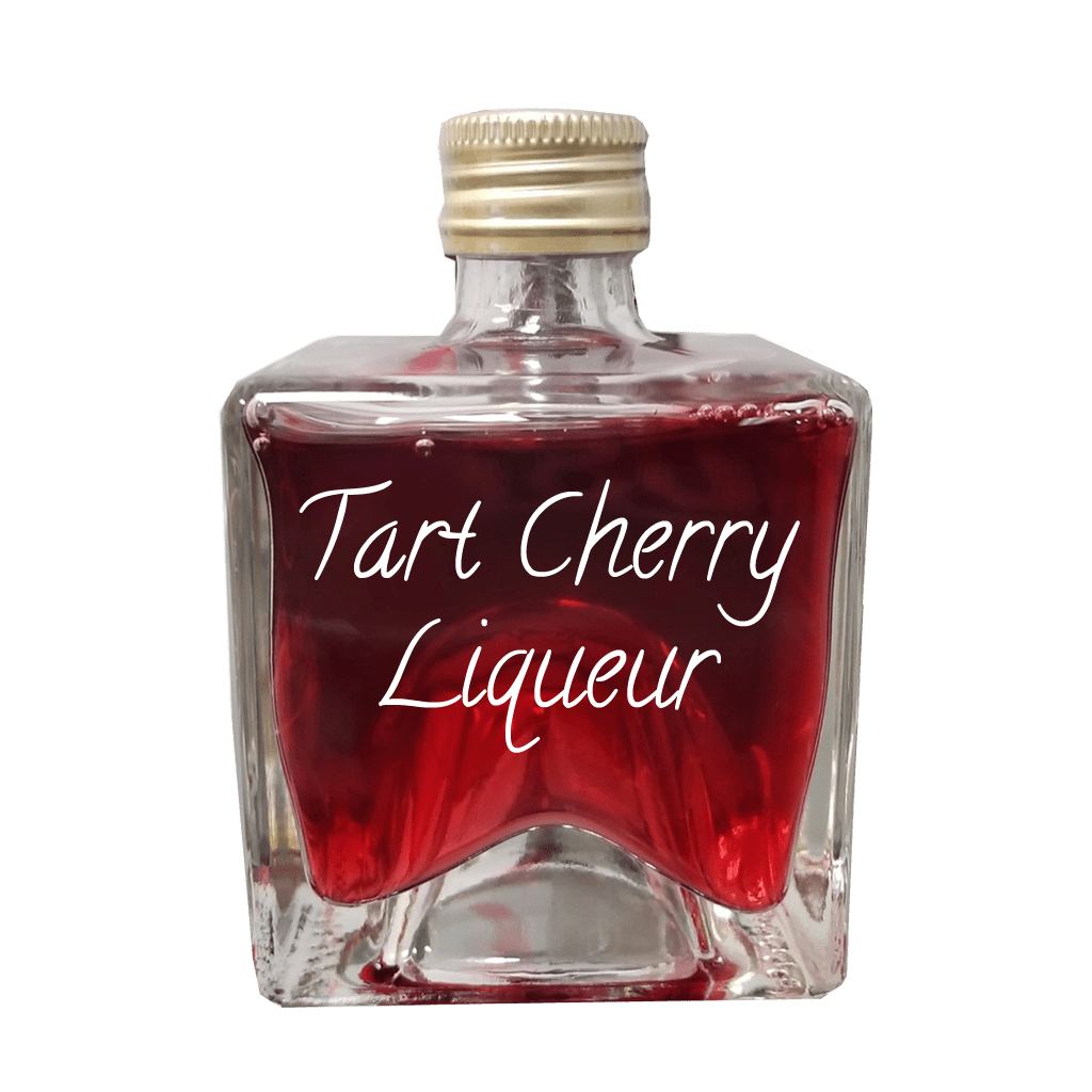 Tart Cherry Liqueur in small bottle. Fruity drinks. Popular alcoholic drinks