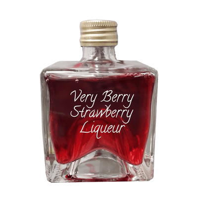 Very Berry Strawberry Liqueur in small bottle. Margarita and martini mix.