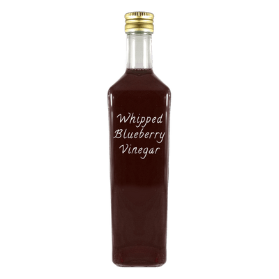 Whipped Blueberry Vinegar in bottle. White balsamic vinegar. Fruity vinegars.