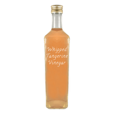 Whipped Tangerine Vinegar in bottle. White balsamic vinegar. Fruity vinegars.