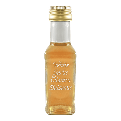 White Garlic Cilantro Balsamic Vinegar in bottle. White balsamic vs dark balsamic. White wine vinegar for cooking.