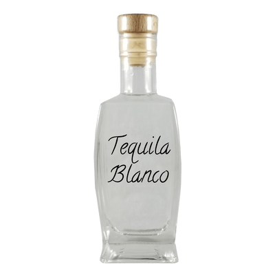 Tequila Blanco in small bottle. Aged alcoholic drinks. Drinks from Mexico.